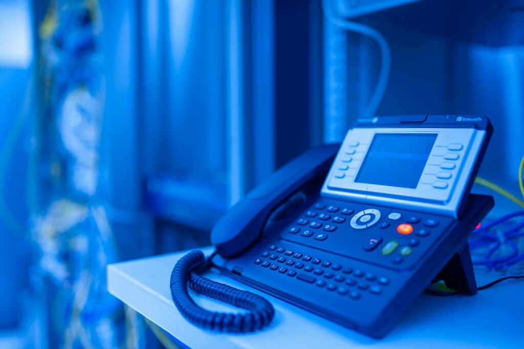 Team collaborating using cloud PBX and IP telephony tools to enable flexible, modern business communication.